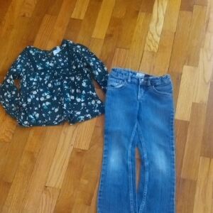 girl 5 bootcut jeans and green long sleeve flower print